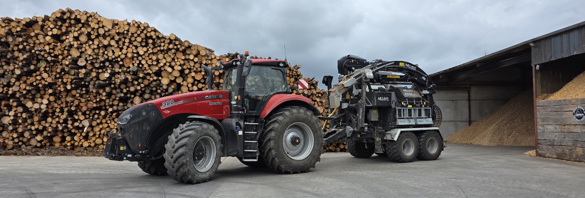 McCauley Wood Fuels tractor, chipper, timber stack and wood chip yard